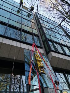 high level glass replacement using floor crane
