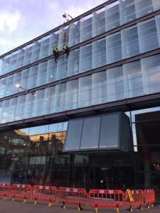 high level glass replacement with abseil team